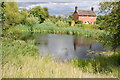 Village pond and cottage, Crowle