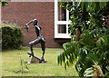 Statue outside Wimborne Minster library