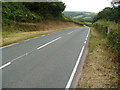 Broken white lines at edge of the A4067 NE of Crai