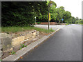 The entrance to Carlett Park and a bench mark