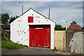 Two red doors at New Cumnock