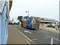 Opened top bus heading up to the Esplanade Roundabout