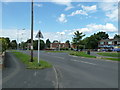 Unusual traffic lights sign at the top of Testbourne Avenue