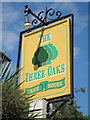 The Three Oaks sign