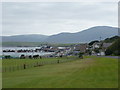 Stromness: wide lawn alongside North End Road