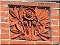 Decorative bas relief stonework on houses in Christchurch Avenue, NW6