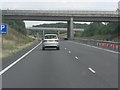 SP6340 : A43 bridge carrying minor road by Stuart Logan
