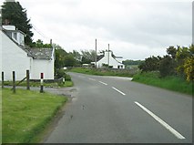NX8555 : Passing Rock Cottage on the A710 by Ann Cook