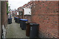 Back alley with bins