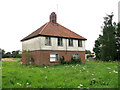 Disused council cottages by Annesons Corner