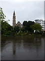 Bournemouth: Richmond Hill St. Andrew?s from across the flooded Gardens