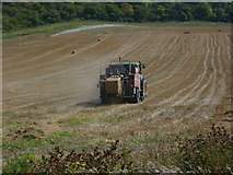 TQ2511 : Tractor at work in stubble field at Fulking (2) by Shazz
