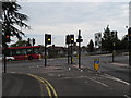 TQ1882 : Traffic lights amber at cycle crossing on Hanger Lane by David Hawgood
