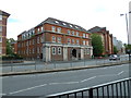 Looking across the A33 to Capella House