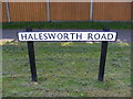TM4977 : Halesworth Road sign by Geographer