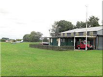 SU5765 : Brimpton Airfield Clubhouse by Stuart Logan