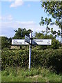 TM2358 : Roadsign at The Street staggered crossroads by Geographer