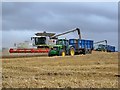 Three Combines At Work