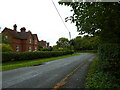 Road heading north-east through Church End