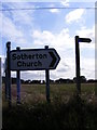 TM4479 : Roadsign & footpath sign on Church Lane, Sotherton by Geographer