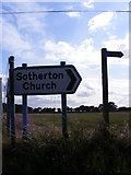TM4479 : Roadsign & footpath sign on Church Lane, Sotherton by Geographer