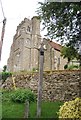 Village sign and church, Birling