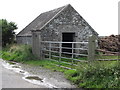 Traditional barn and manure heap alongside Church Road