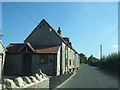 A row of cottages beside the road on the east of Chilton Polden