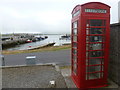 Pierowall: phone box by Gill Pier