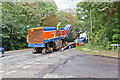 Road Planing machine being loaded