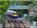 Train approaching South Acton station