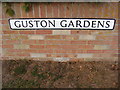 Guston Gardens sign