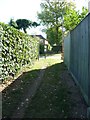 Path from Send Barns Lane arriving at Boughton Hall Avenue