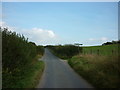 A footpath crosses over Burnt House Lane