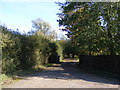 TM3376 : The entrance to Valley Farm & footpath to Bush Hill Farm by Geographer