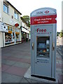 Cash machine and telephone