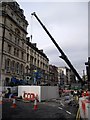 Installing a new street clock (3), St Mary St, Cardiff