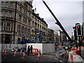 Installing a new street clock (4), St Mary St, Cardiff