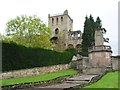 Jedburgh  War Memorial and east  tower of  Jedburgh Abbey