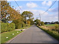 TM4282 : Station Road looking towards the A145 by Geographer