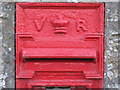 NZ1266 : Victorian postbox, Houghton - aperture by Mike Quinn