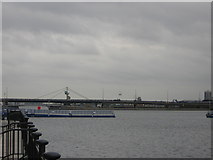 TQ4180 : Royal Victoria Dock, with plane landing at London City Airport by Christopher Hilton