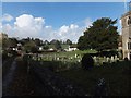 Churchyard of St Andrew, Feniton and older part of the village