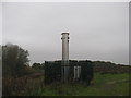 Former landfill site with (?) methane burner