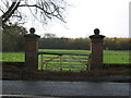 Ornamental gateway framing the view of Pasture from Bostock Hall