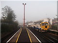 TQ7768 : Gillingham Railway Station and Matisa tamper by David Anstiss