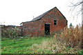 SJ9729 : Red Brick Barn on Wetmoor Green by Mick Malpass