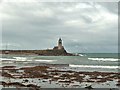 NX0940 : Port Logan lighthouse and harbour wall by Ann Cook