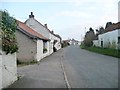 TA0579 : Whitewashed houses in Folkton by Christine Johnstone