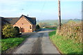 House on a Hillside near Wooliscroft